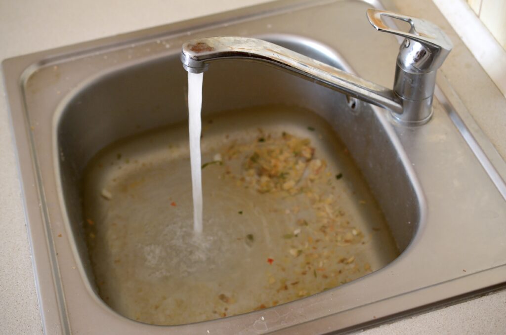 blocked drain from kitchen sink cleaning it